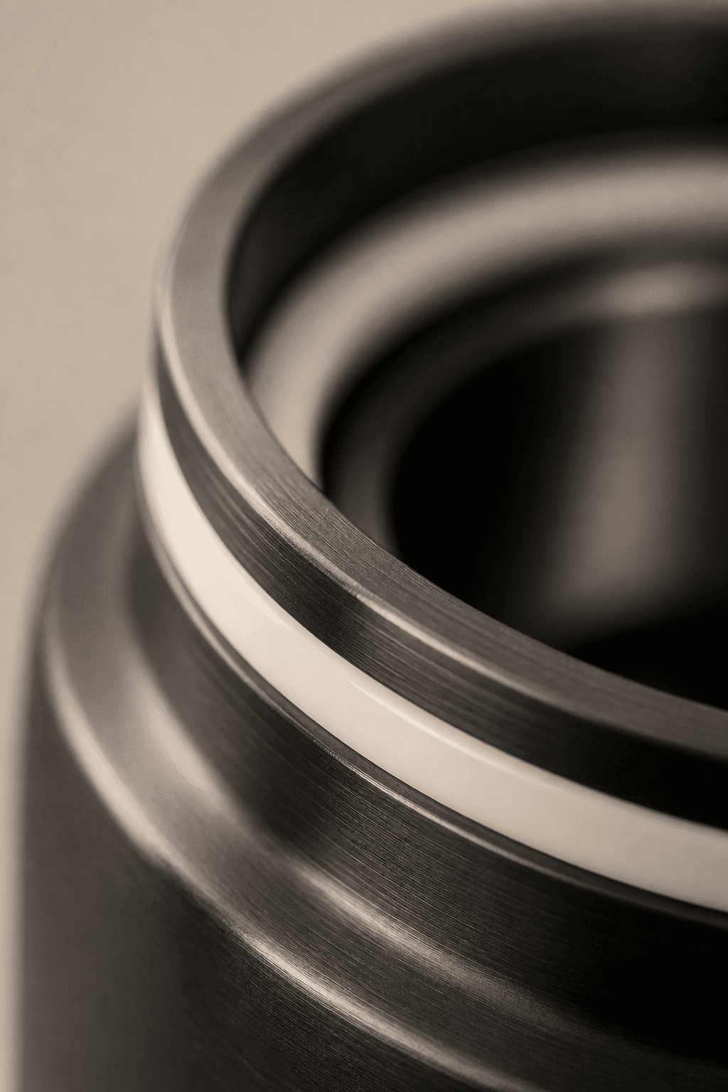 Alumina ceramic isolation ring at the neck joint